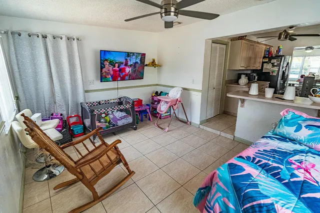 a view of a workspace with furniture
