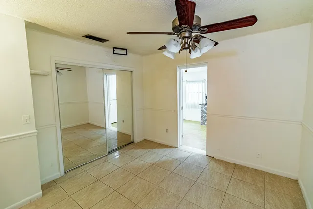 a view of a bathroom with a shower and a sink