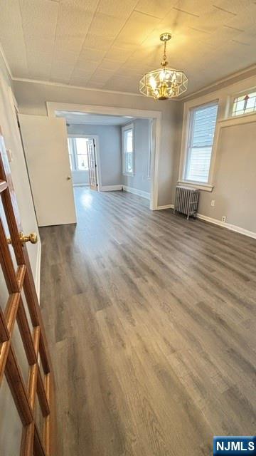 760 Hamilton Street, Unit 1 Harrison, NJ 07029 - Photo 5 of 23 wooden floor in an empty room with a window