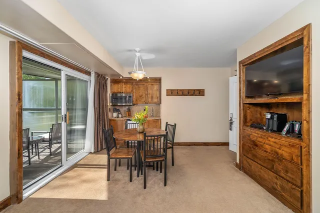 a view of a dining room with furniture