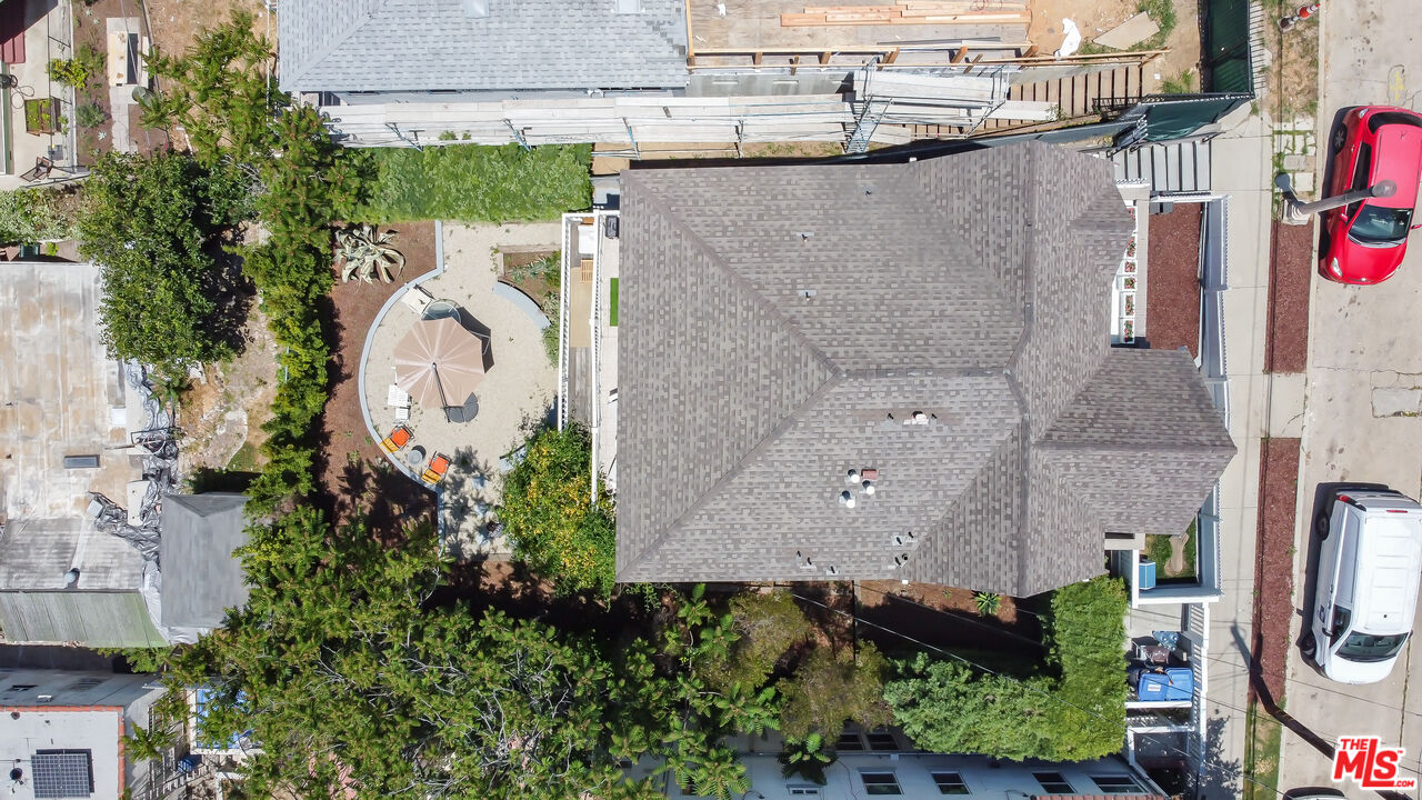 1120 West Edgeware Road Los Angeles, CA 90026 - Photo 29 of 32 an aerial view of a house with a yard and garden