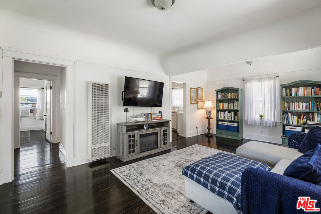 1120 West Edgeware Road Los Angeles, CA 90026 - Photo 10 of 32 a living room with furniture and a flat screen tv