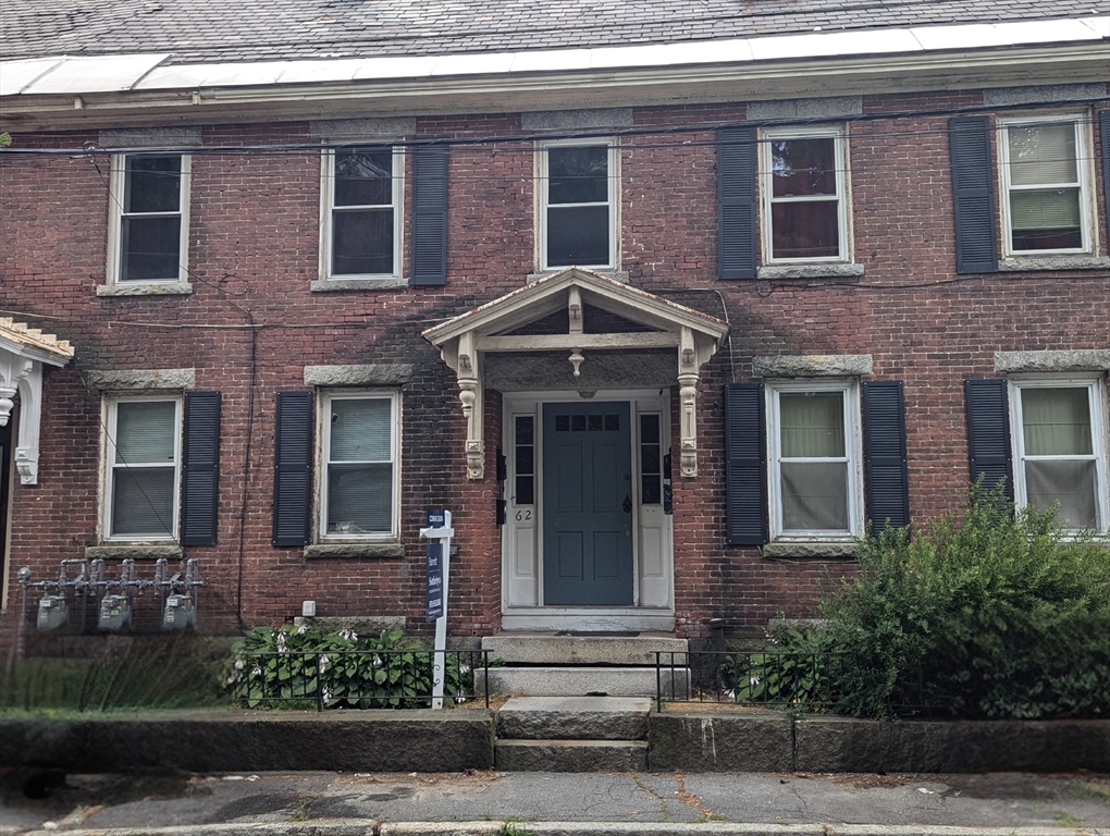 62 Grove Street Fitchburg, MA 01420 - Photo 2 of 4 a front view of a house