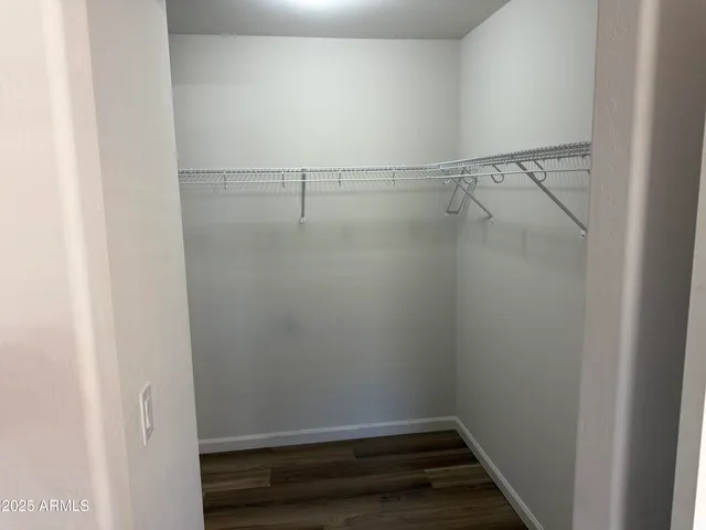 a view of an empty walk in closet