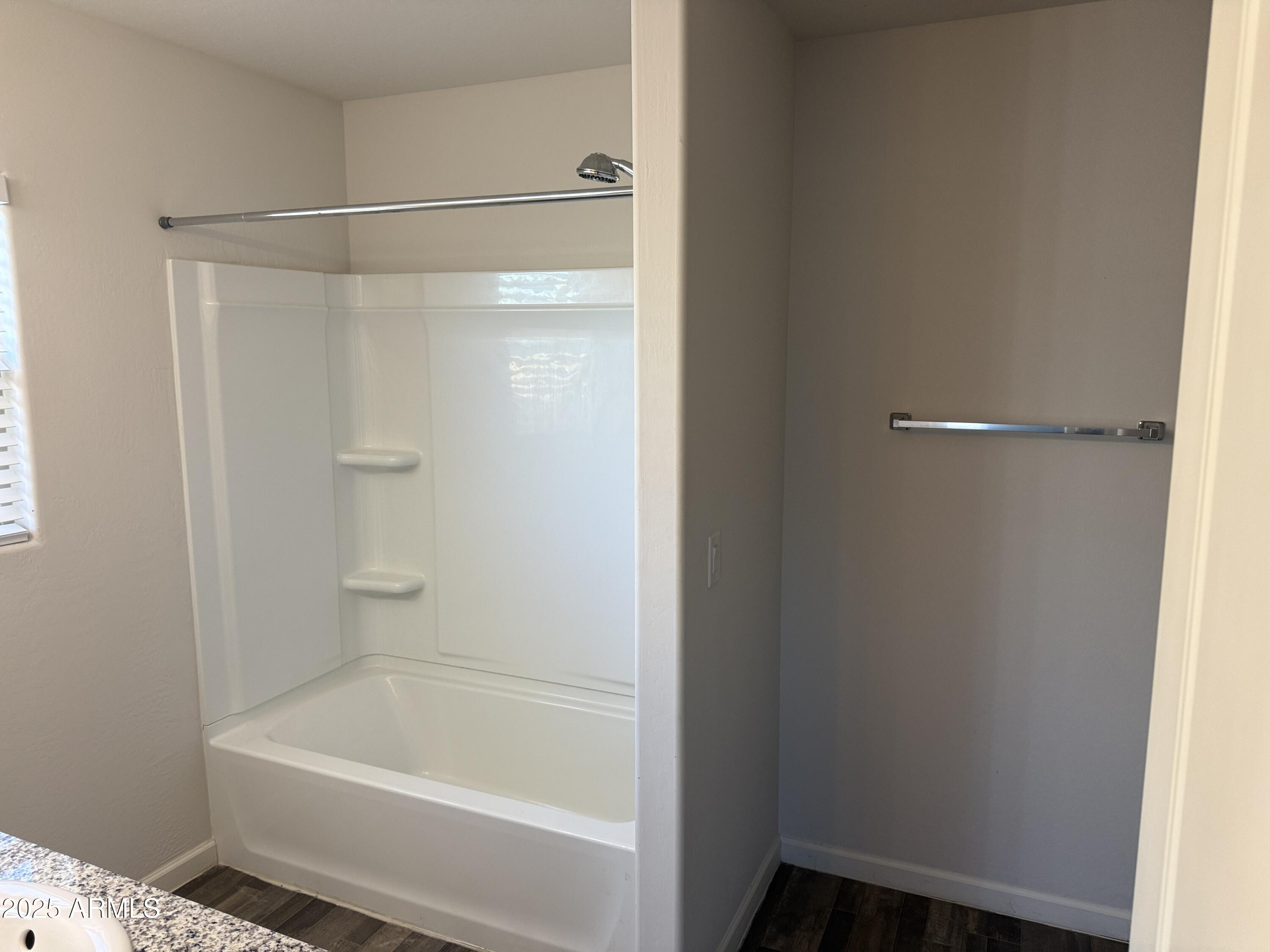 1098 South 11th Street Coolidge, AZ 85128 - Photo 16 of 20 a bathroom with a shower and a bath tub