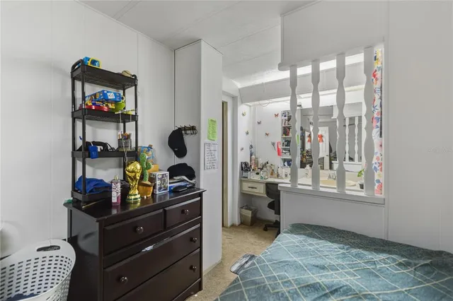 a room with furniture and a window