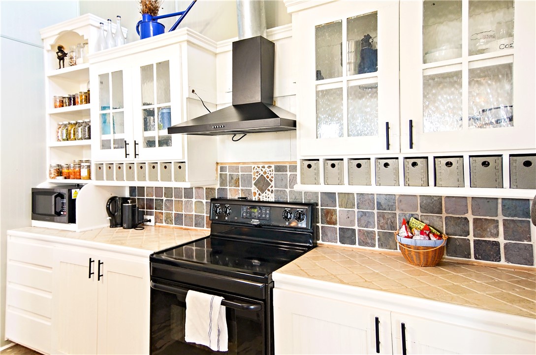 147 Trail Ridge Drive Sandia, TX 78383 - Photo 12 of 31 a kitchen with a sink and a stove