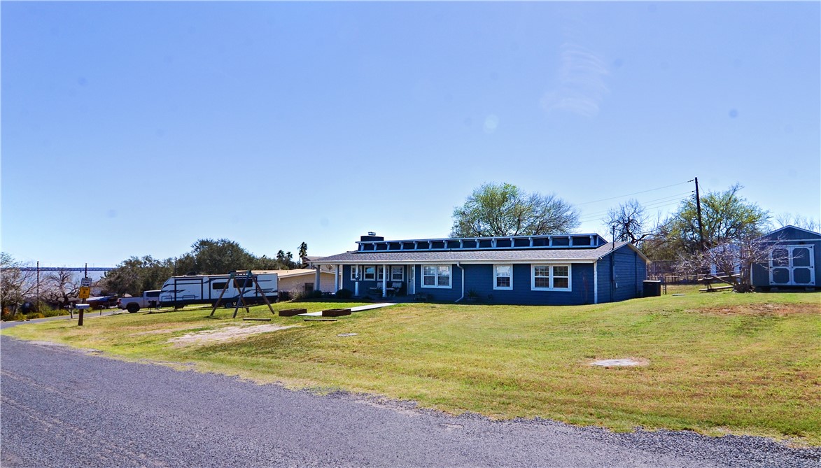 147 Trail Ridge Drive Sandia, TX 78383 - Photo 2 of 31 a view of a house with swimming pool and yard
