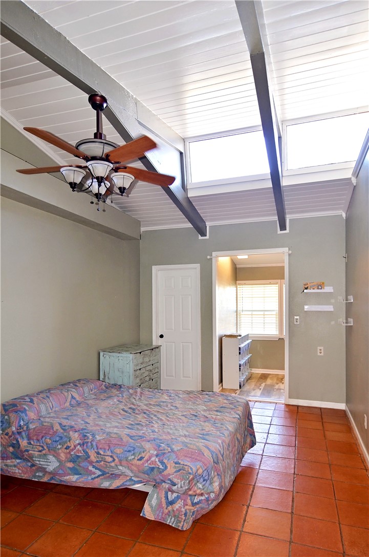 147 Trail Ridge Drive Sandia, TX 78383 - Photo 22 of 31 a bedroom with a bed and a large window