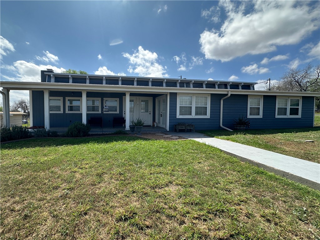 147 Trail Ridge Drive Sandia, TX 78383 - Photo 30 of 31 a view of a house with a garden and yard