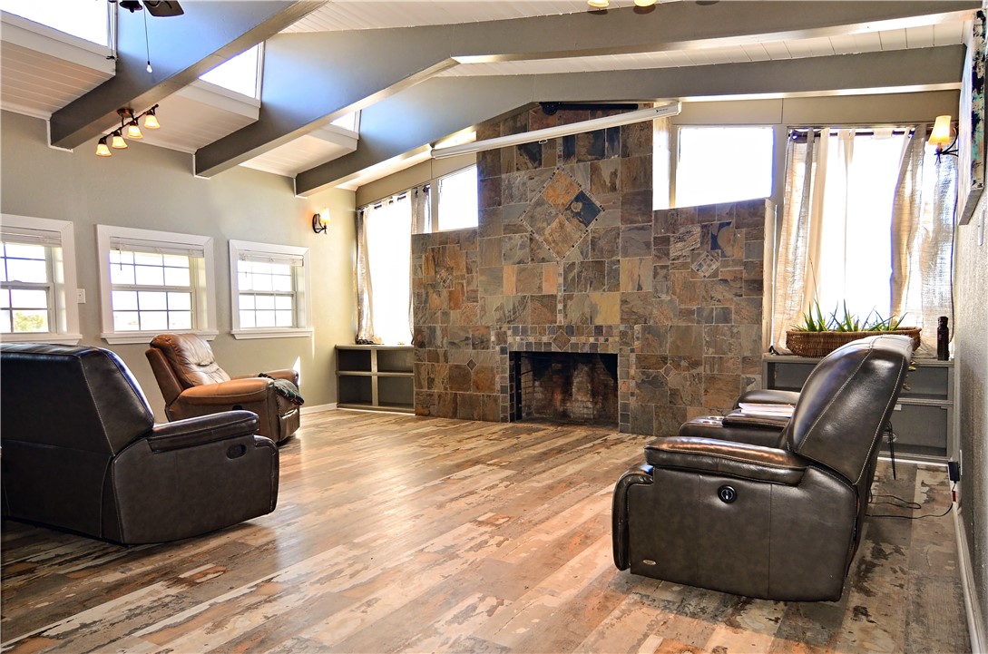 147 Trail Ridge Drive Sandia, TX 78383 - Photo 6 of 31 a living room with furniture and a fireplace