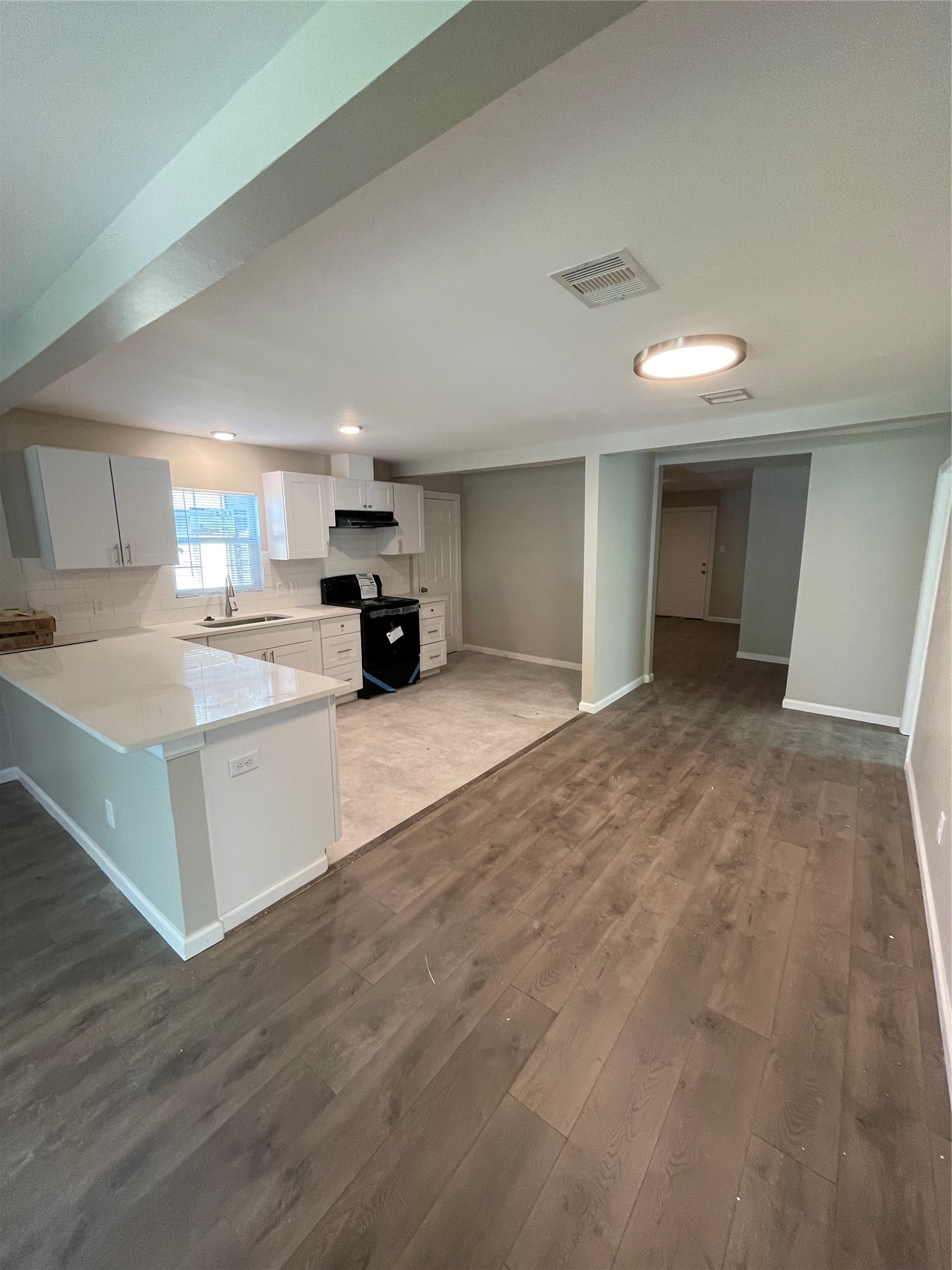 3211 Retta Street Houston, TX 77026 - Photo 1 of 10 open space to living room and kitchen area