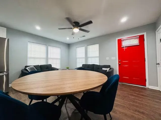 a view of a dining room with furniture
