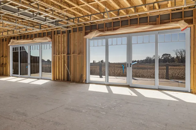 a view of an empty room with a balcony