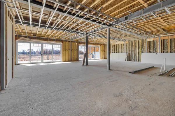 a view of entryway with furniture and rug