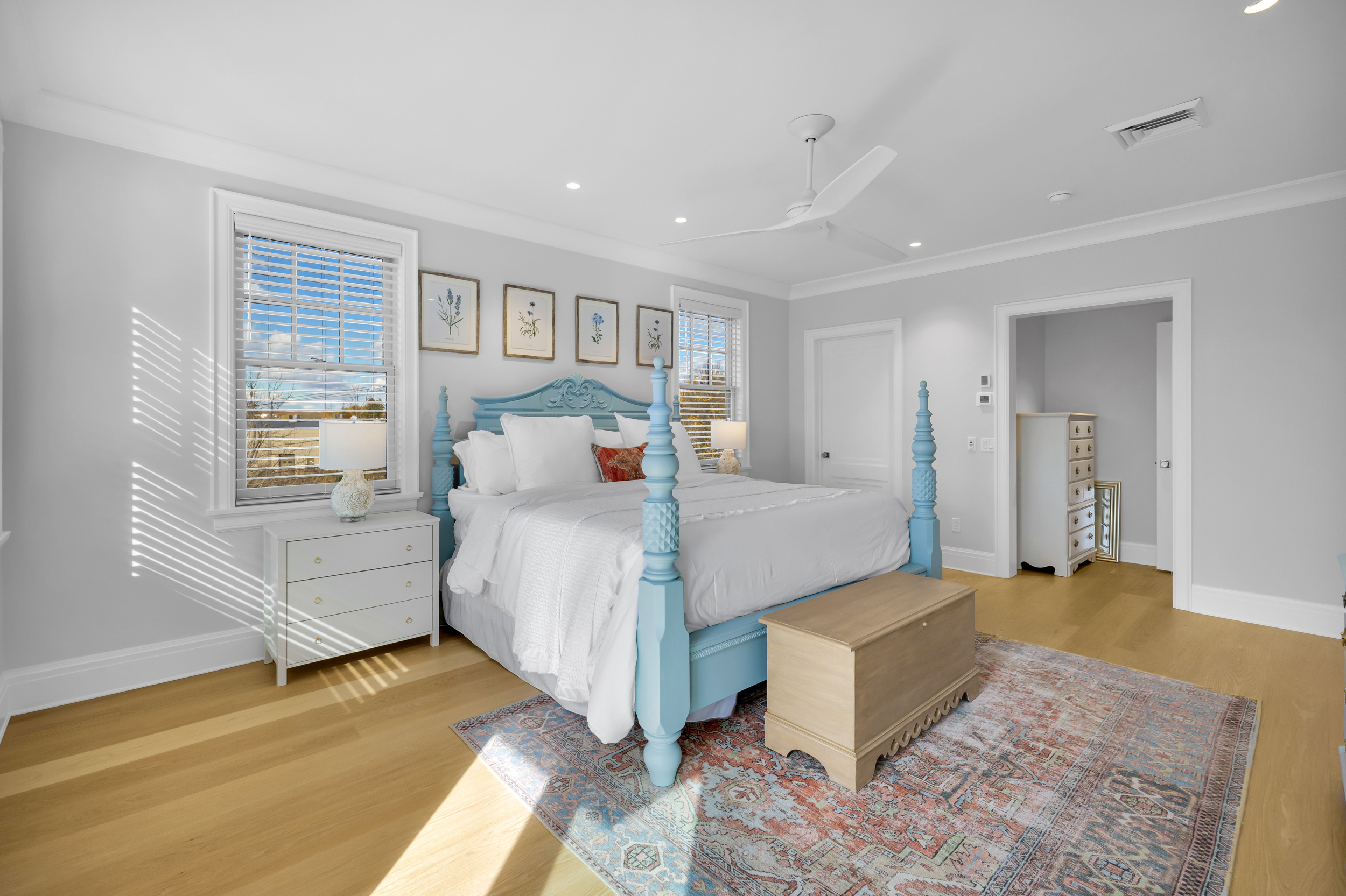 405 Whitfield Street, Unit 2 Guilford, CT 06437 - Photo 15 of 40 a bedroom with a large bed and a window