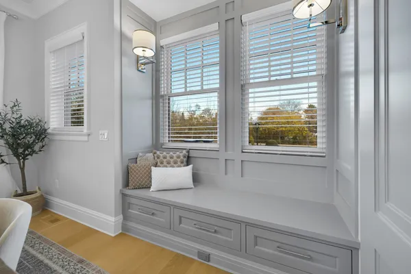 a living room with furniture fireplace and a flat screen tv
