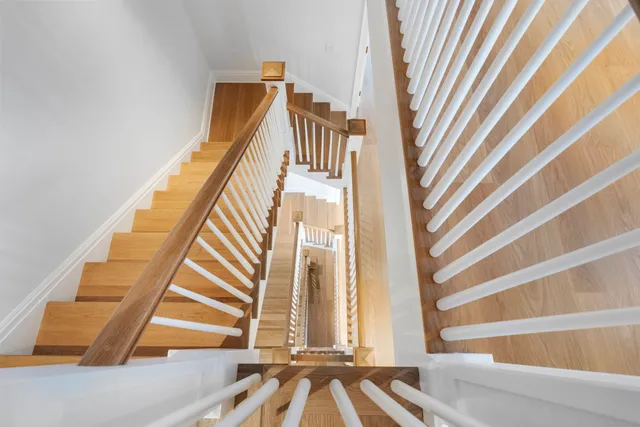 a view of living room that has a large window