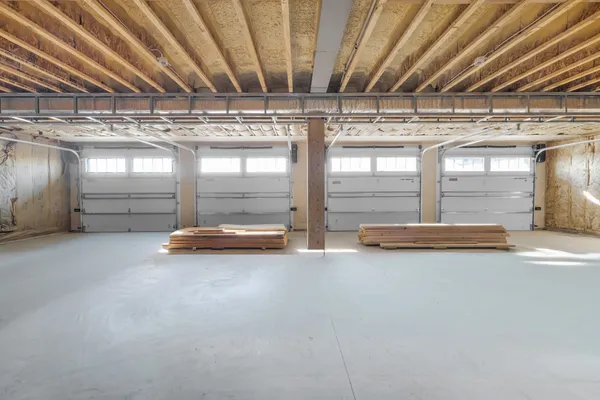 a bathroom with a shower and a door