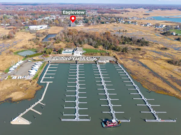 a spacious bathroom with a double vanity sink tub and a mirror