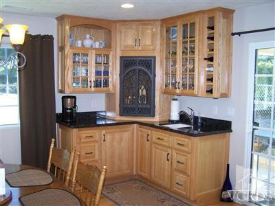1089 Rambling Road Simi Valley, CA 93065 - Photo 4 of 25 a bathroom with granite countertop a sink a toilet and a shower