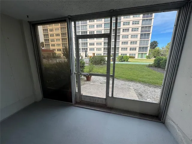 a view of a room with a large window