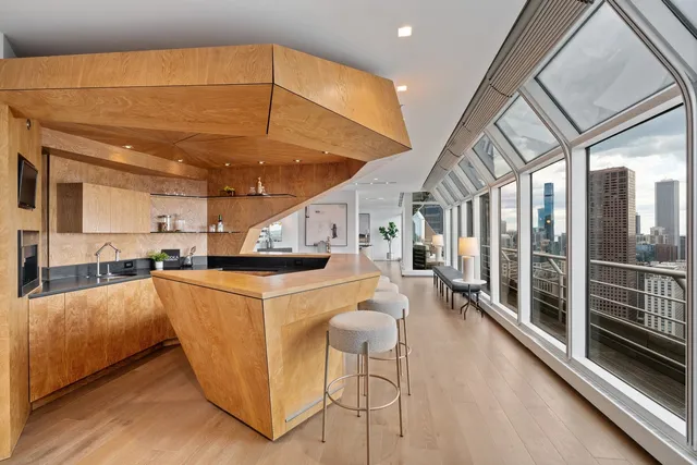 a bedroom with a bed and a mirror