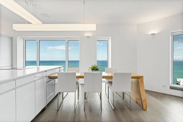 a kitchen with a sink and a refrigerator
