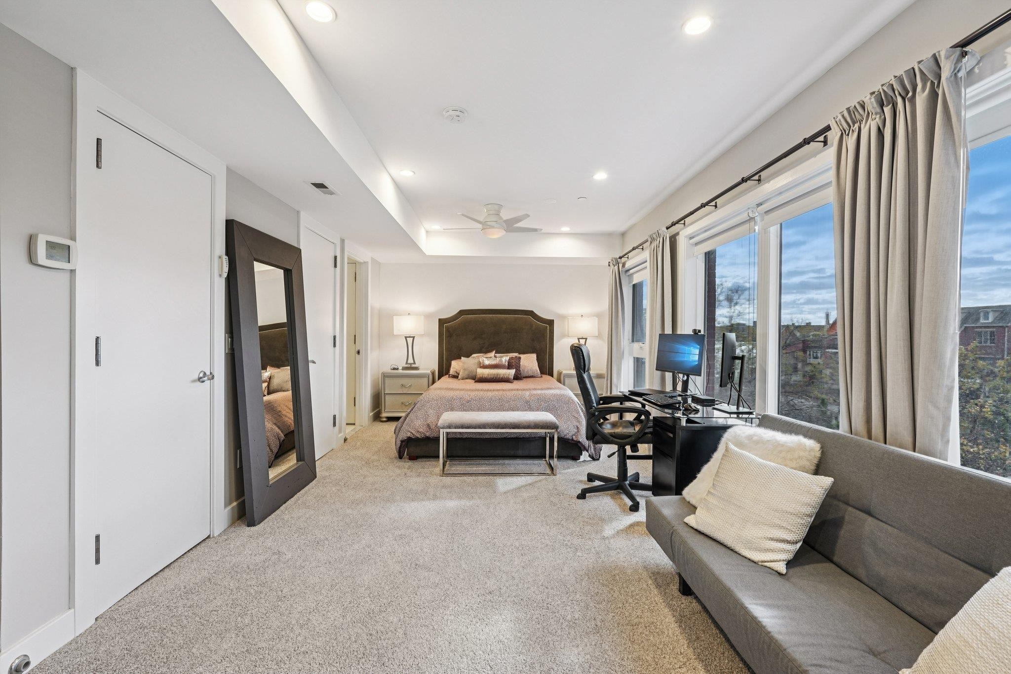 25 Vela Way, Unit 25 Edgewater, NJ 07020 - Photo 1 of 42 a living room with furniture and a window