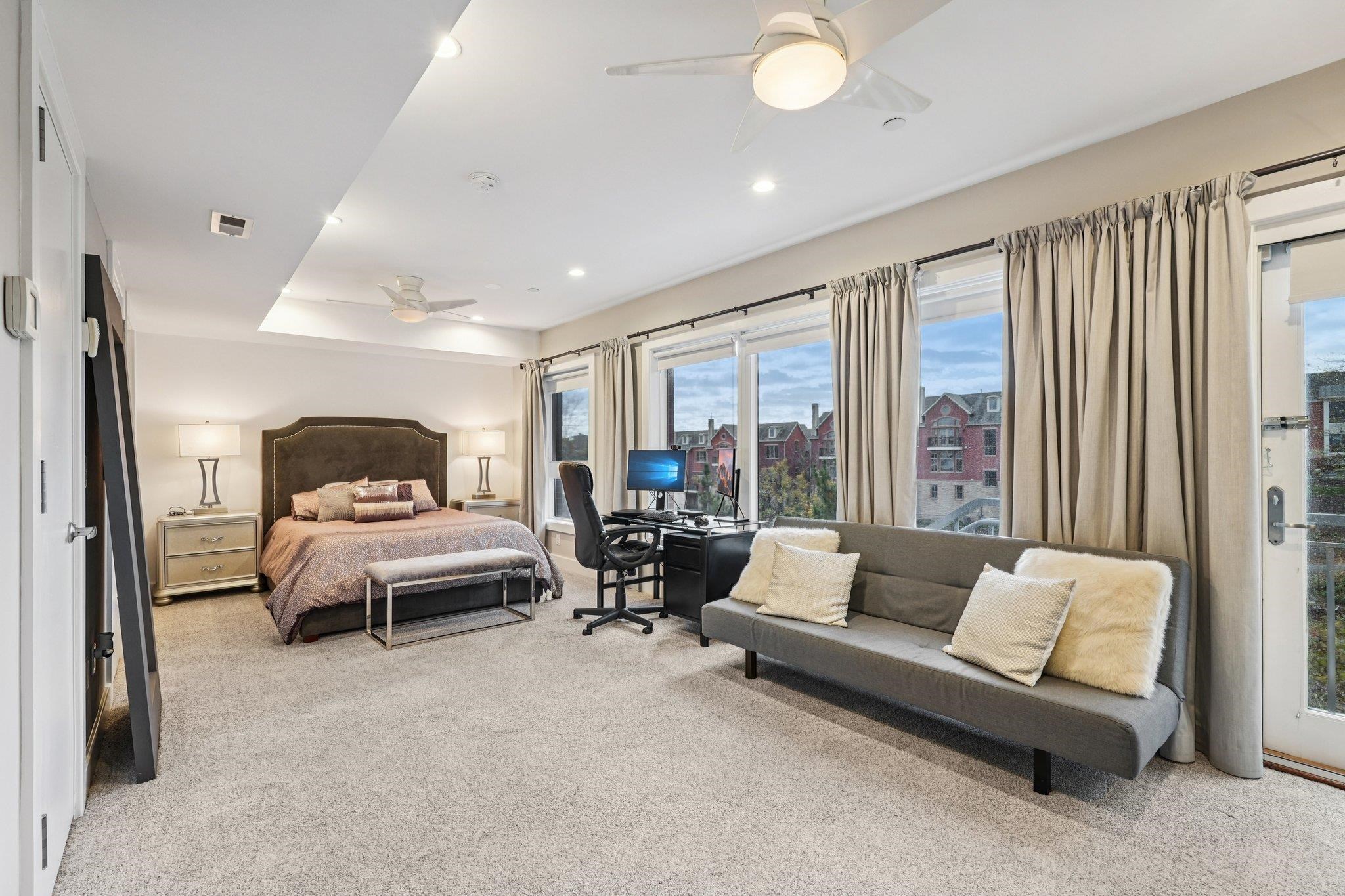 25 Vela Way, Unit 25 Edgewater, NJ 07020 - Photo 35 of 42 a living room with furniture and a large window