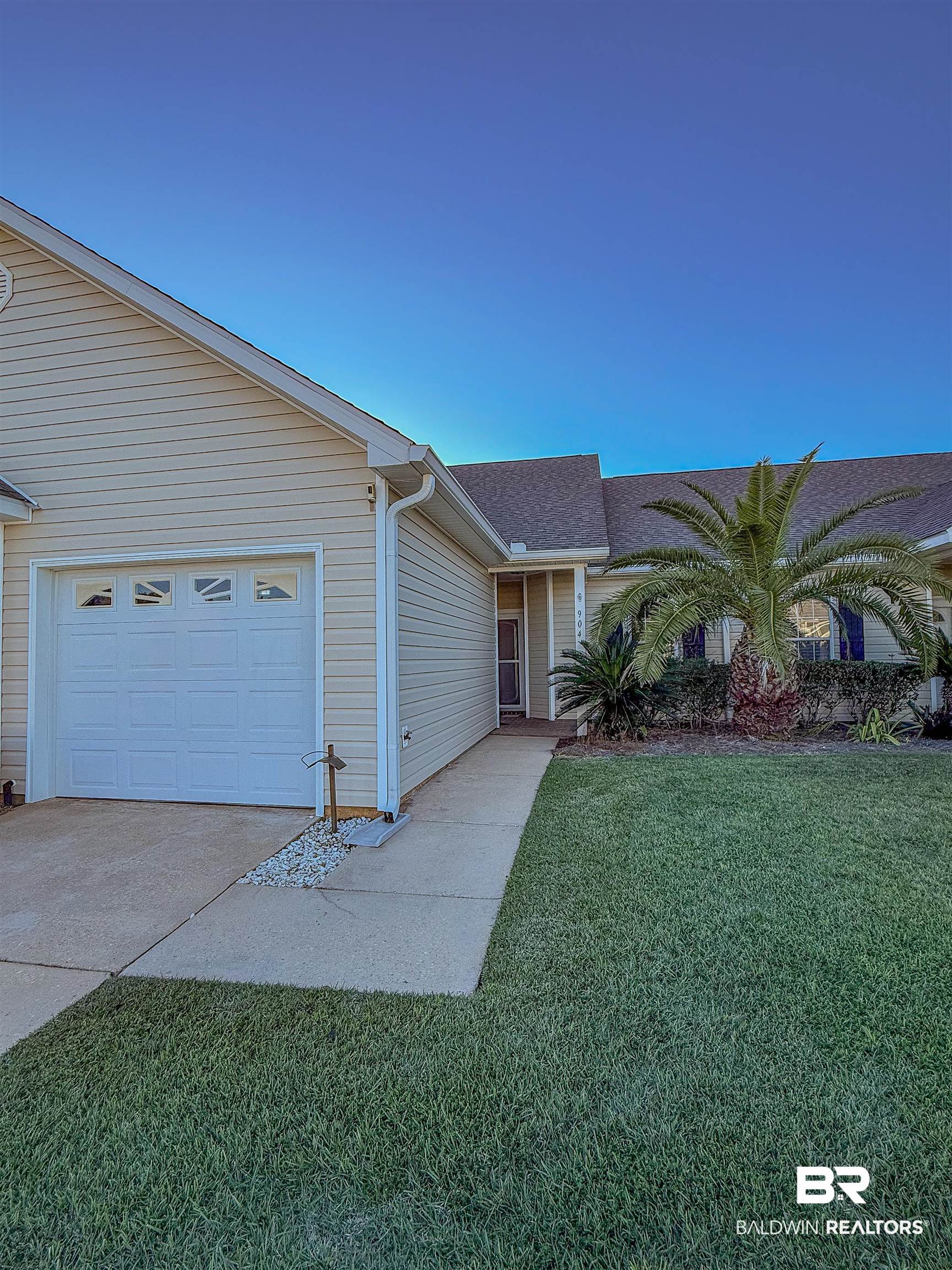 2651 South Juniper Street Foley, AL 36535 - Photo 1 of 20 Single story home featuring a front yard, driveway, a shingled roof, and a garage
