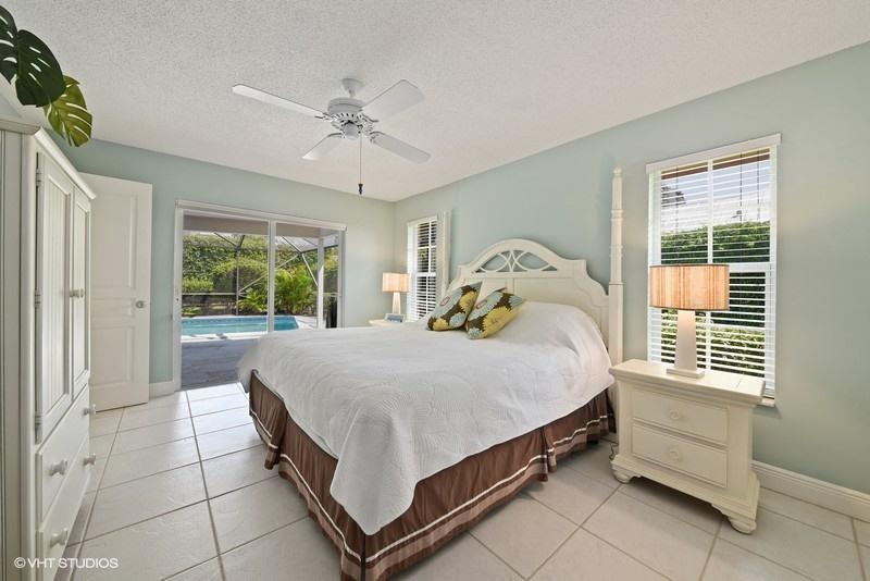 1240 Gulfstream Way Riviera Beach, FL 33404 - Photo 10 of 17 12_1240GulfstreamWay_14_MasterBedroom_Fl