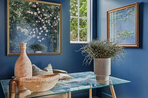 a vase of flowers sitting on a table