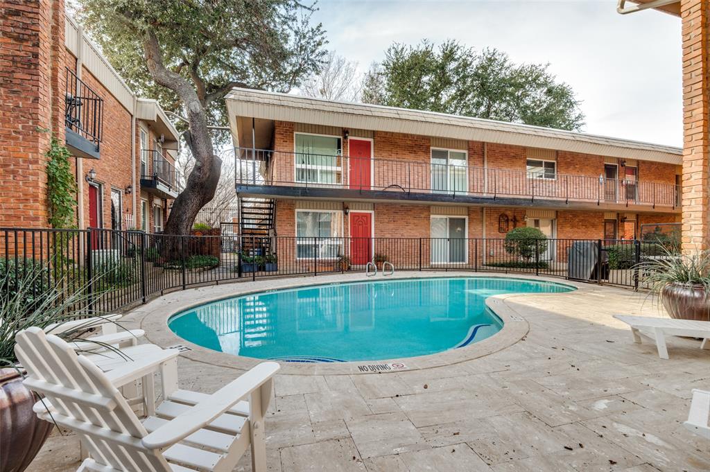 4340 Cedar Springs Road, Unit 205 Dallas, TX 75219 - Photo 10 of 12 a view of a house with swimming pool