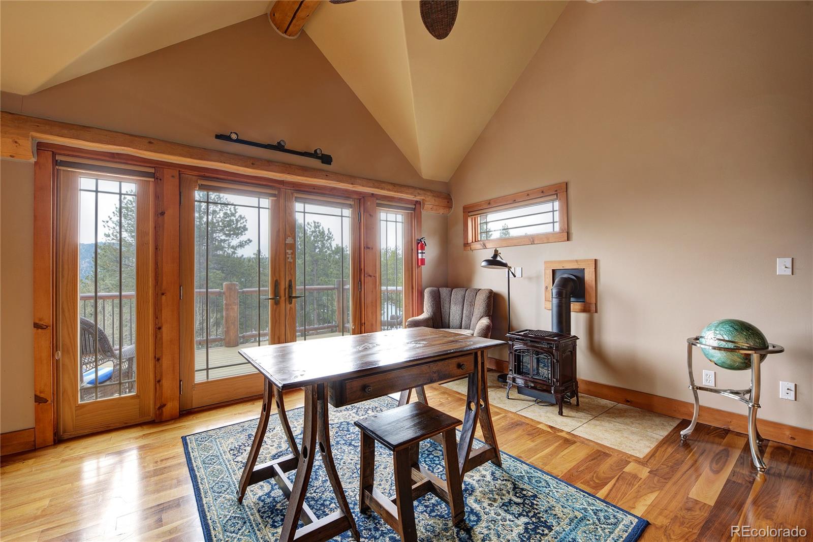 500 Ridge Road Ward, CO 80481 - Photo 15 of 31 a view of a dining room with furniture window and wooden floor