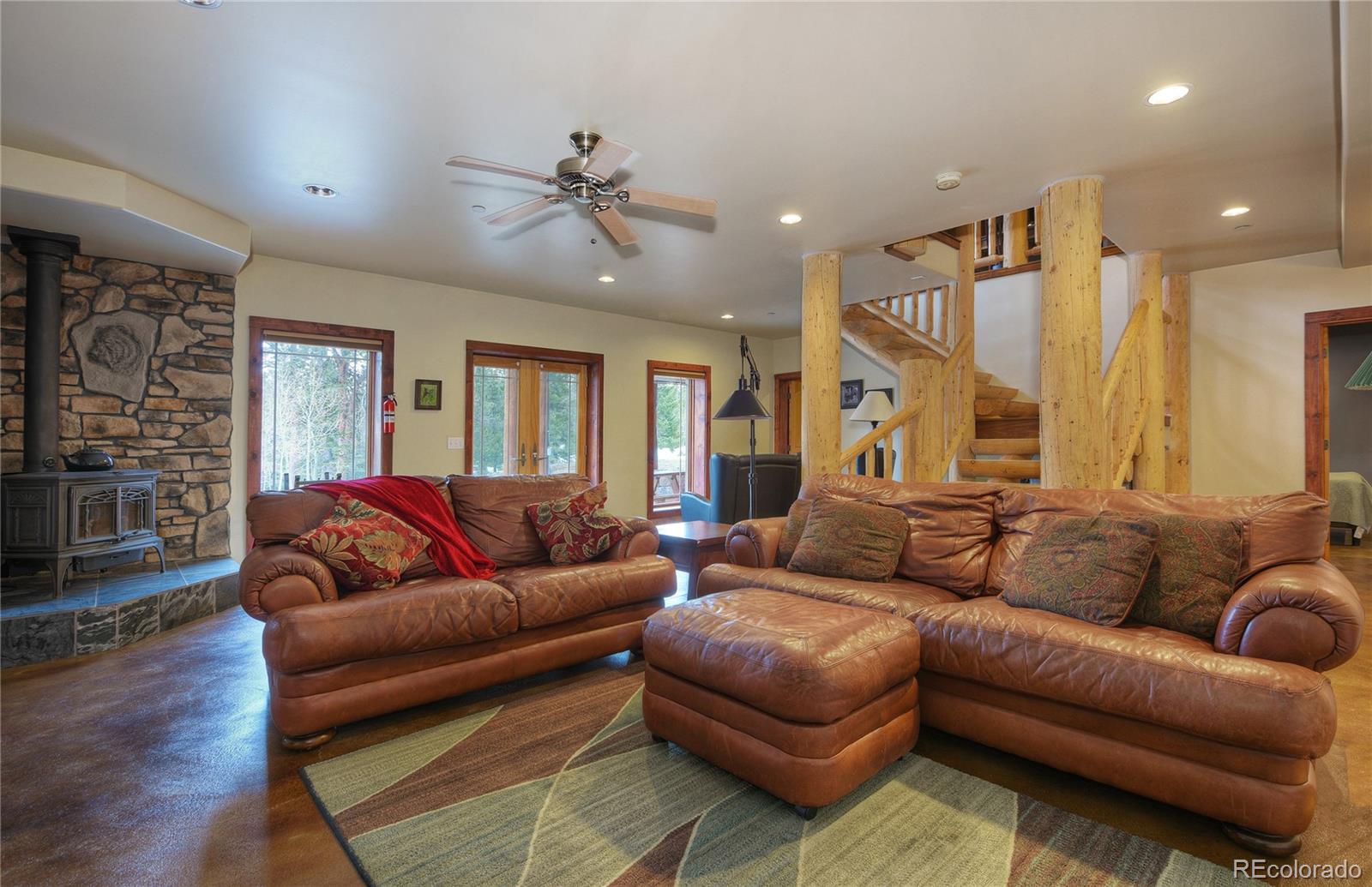 500 Ridge Road Ward, CO 80481 - Photo 21 of 31 a living room with furniture and a large window