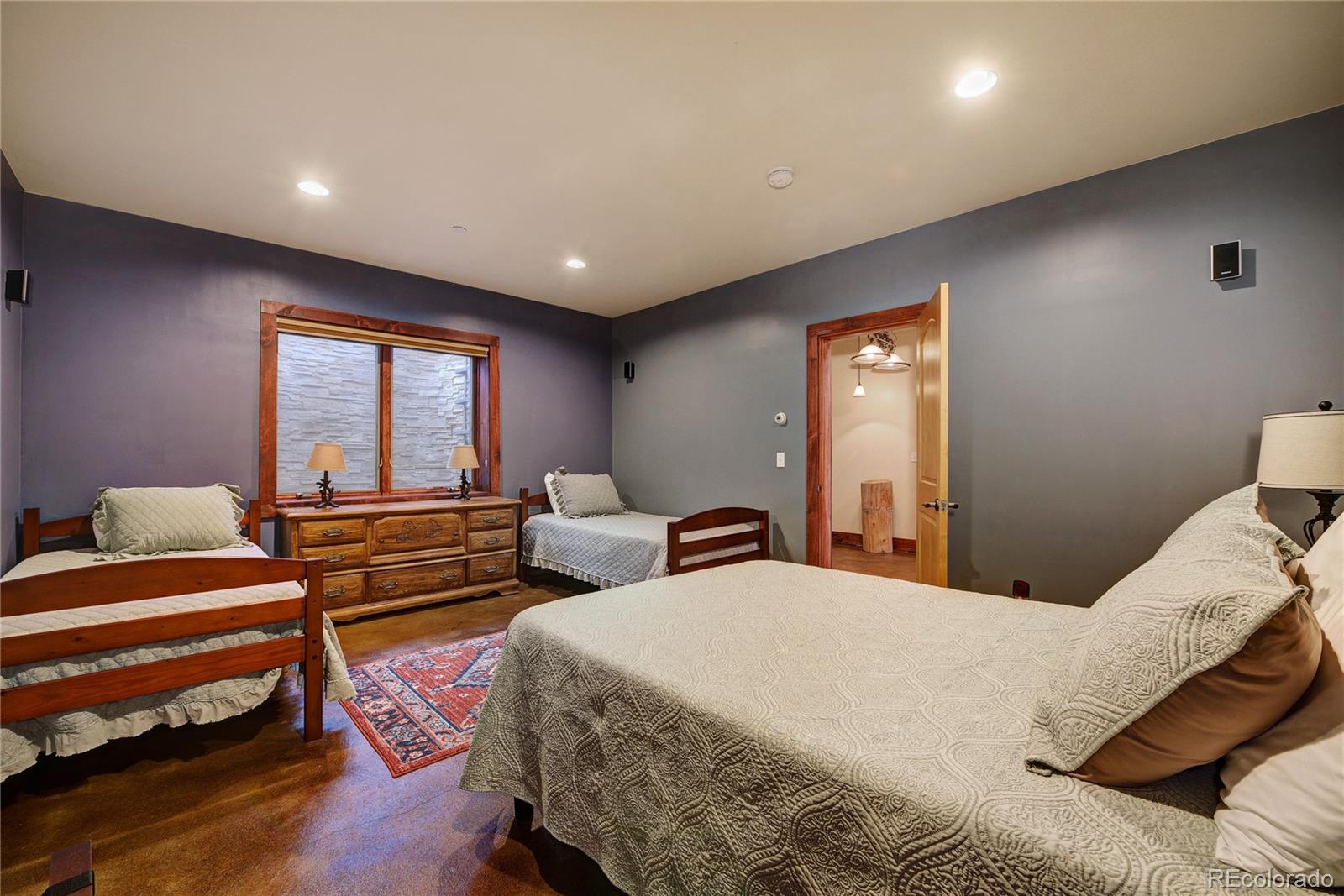 500 Ridge Road Ward, CO 80481 - Photo 24 of 31 a bedroom with a bed and a window