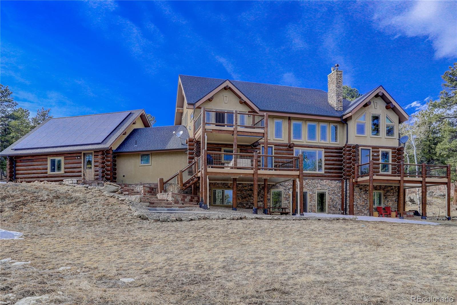 500 Ridge Road Ward, CO 80481 - Photo 30 of 31 a front view of a house with a yard
