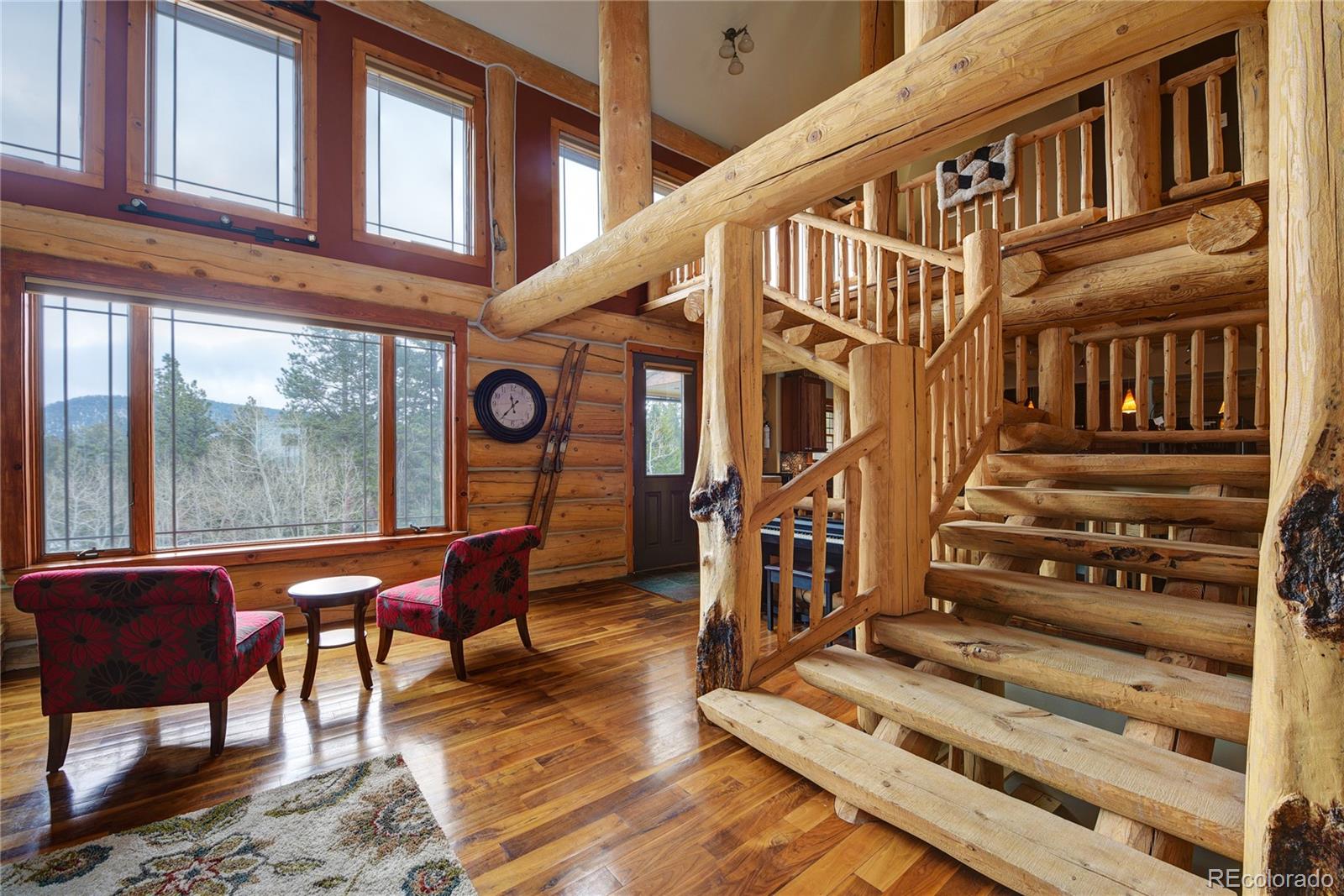 500 Ridge Road Ward, CO 80481 - Photo 9 of 31 a view of a chairs and table in the balcony
