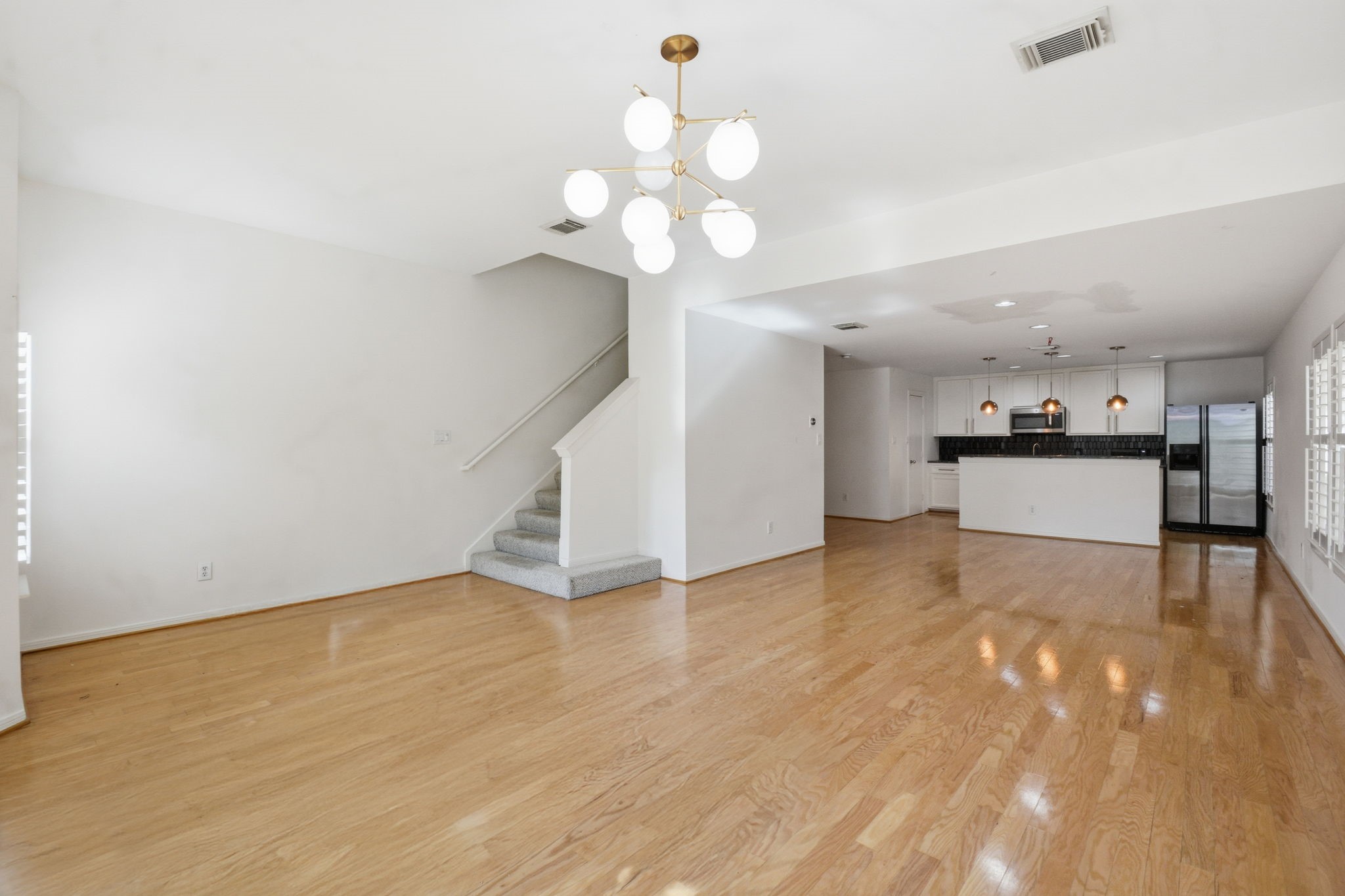 1714 West Webster Street Houston, TX 77019 - Photo 20 of 39 a view of a kitchen with a dishwasher and a microwave