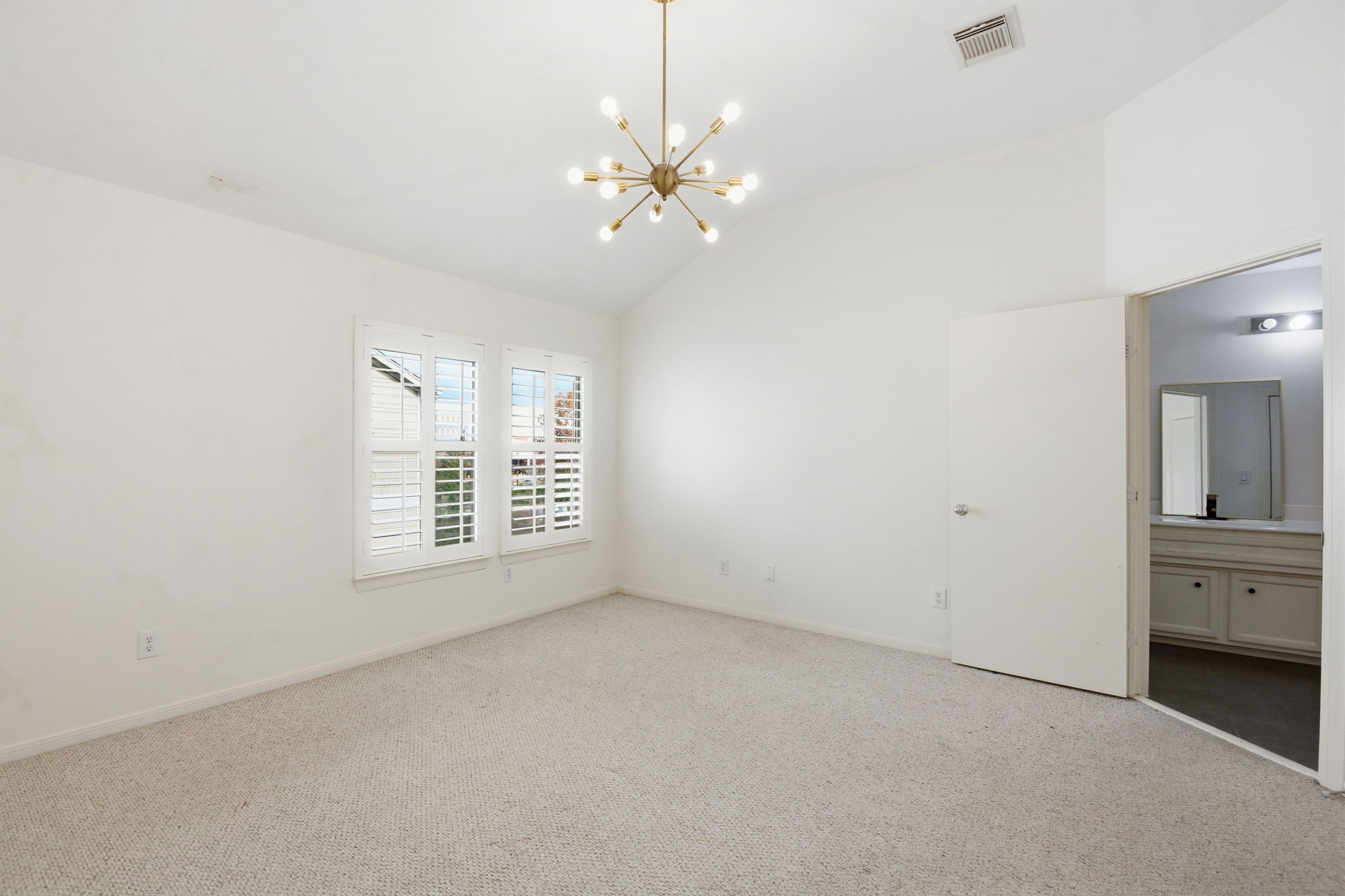 1714 West Webster Street Houston, TX 77019 - Photo 28 of 39 a view of an empty room with a window