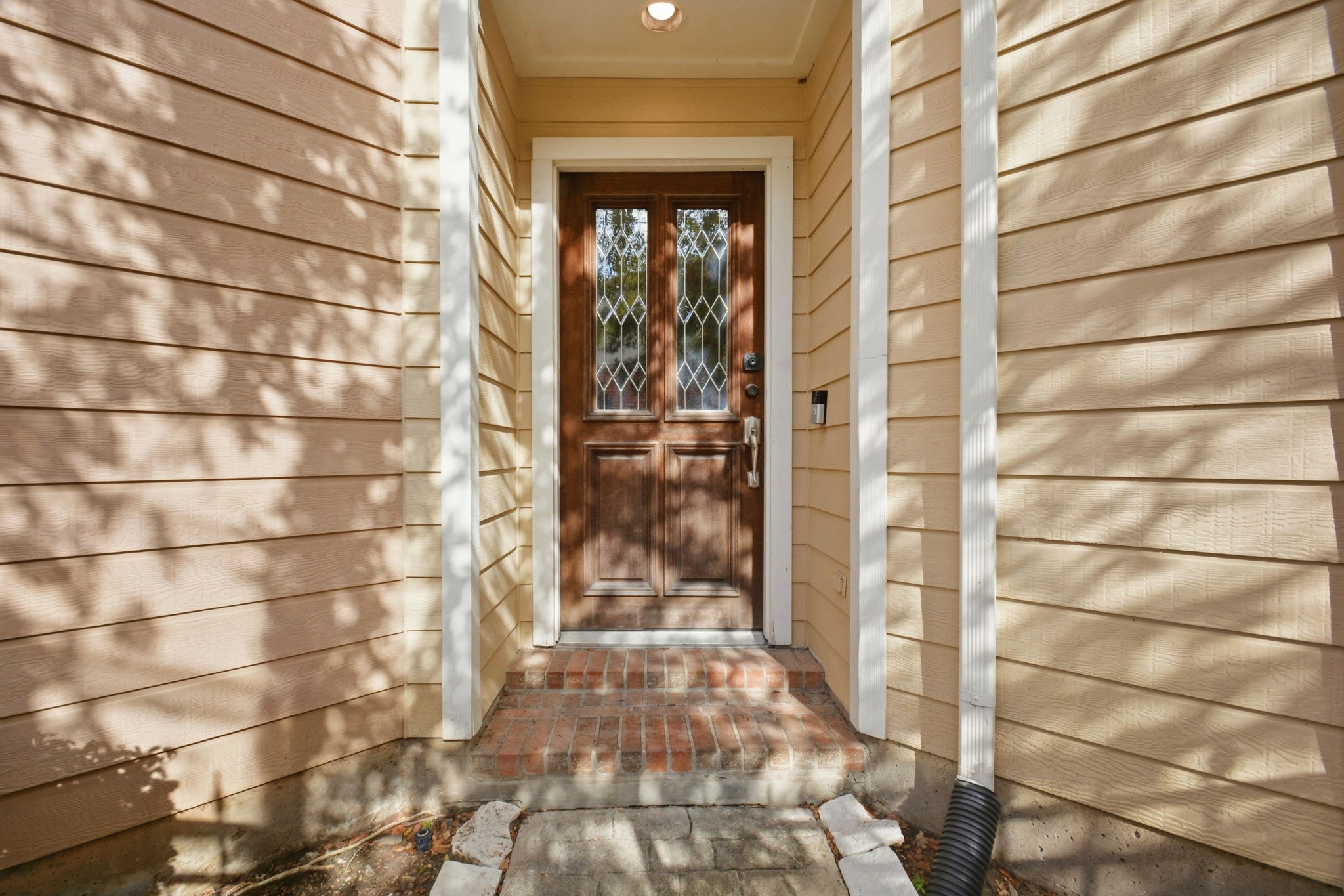 1714 West Webster Street Houston, TX 77019 - Photo 6 of 39 a view of a brick house with a glass door