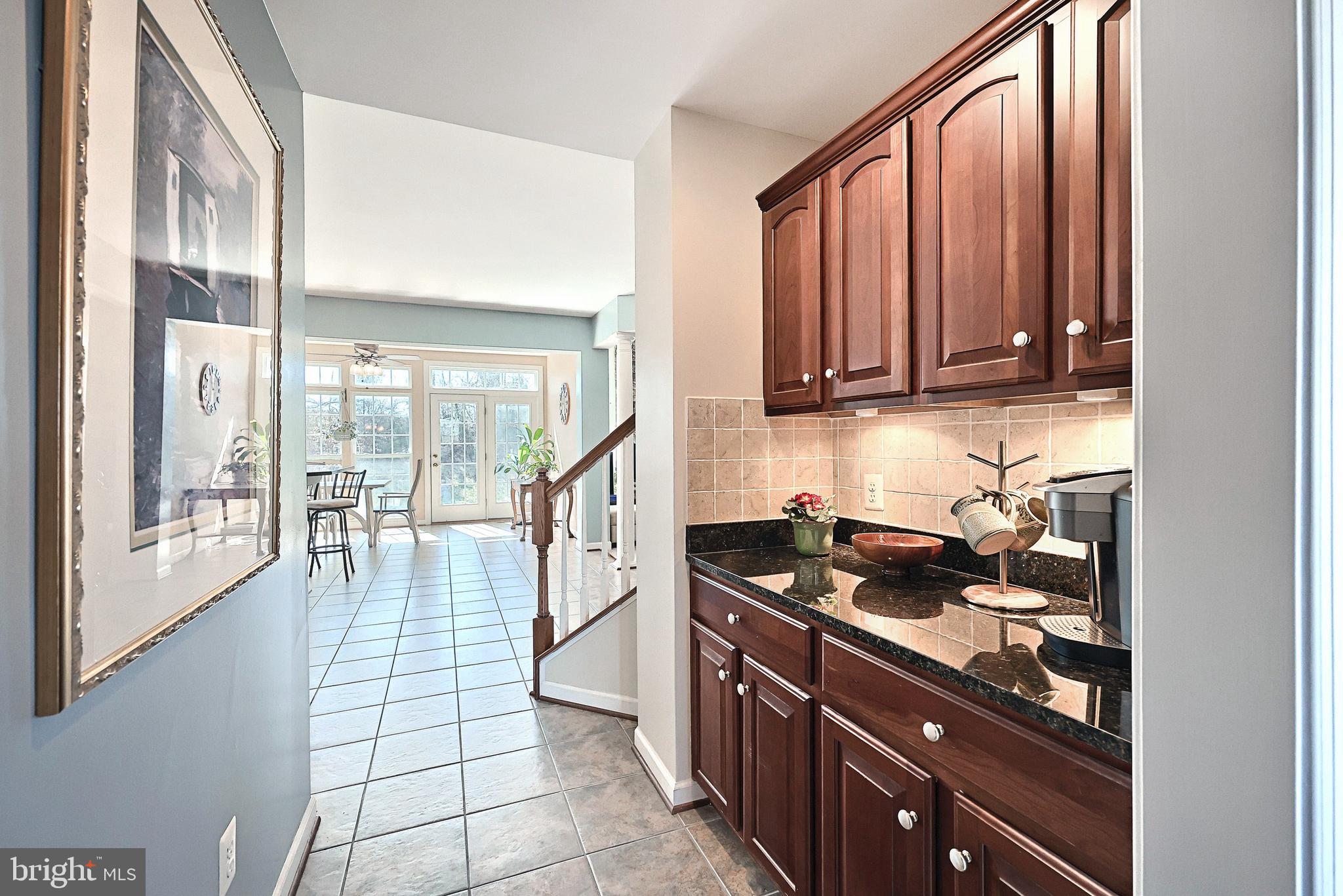 195 Fawn Hill Road Hanover, PA 17331 - Photo 29 of 73 a kitchen with stainless steel appliances granite countertop a stove a sink and a microwave