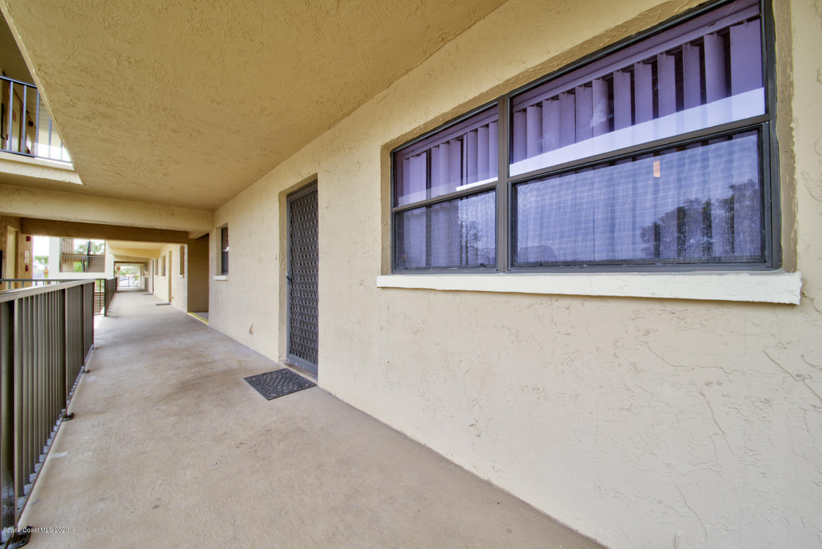 325 Tangle Run Boulevard, Unit 1125 Melbourne, FL 32940 - Photo 4 of 22 a view of a house with stairs