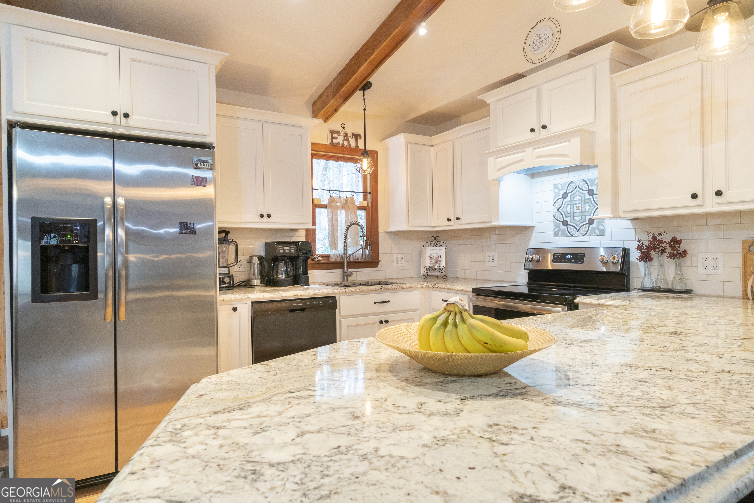 168 Cherokee Trail Sautee Nacoochee, GA 30571 - Photo 33 of 80 a kitchen with a refrigerator a stove a sink and a cabinets