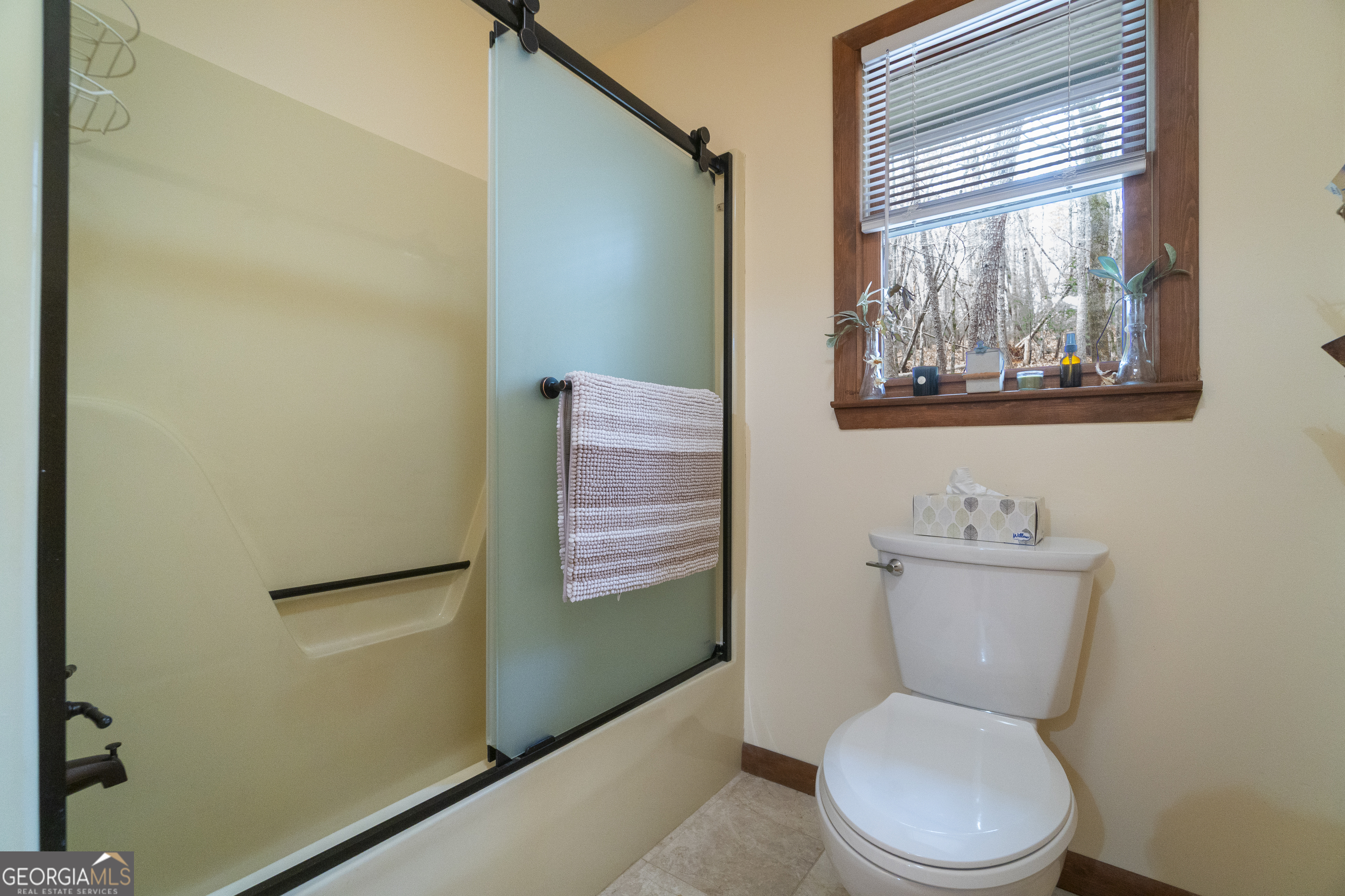 168 Cherokee Trail Sautee Nacoochee, GA 30571 - Photo 59 of 80 a white toilet sitting next to a bathroom sink