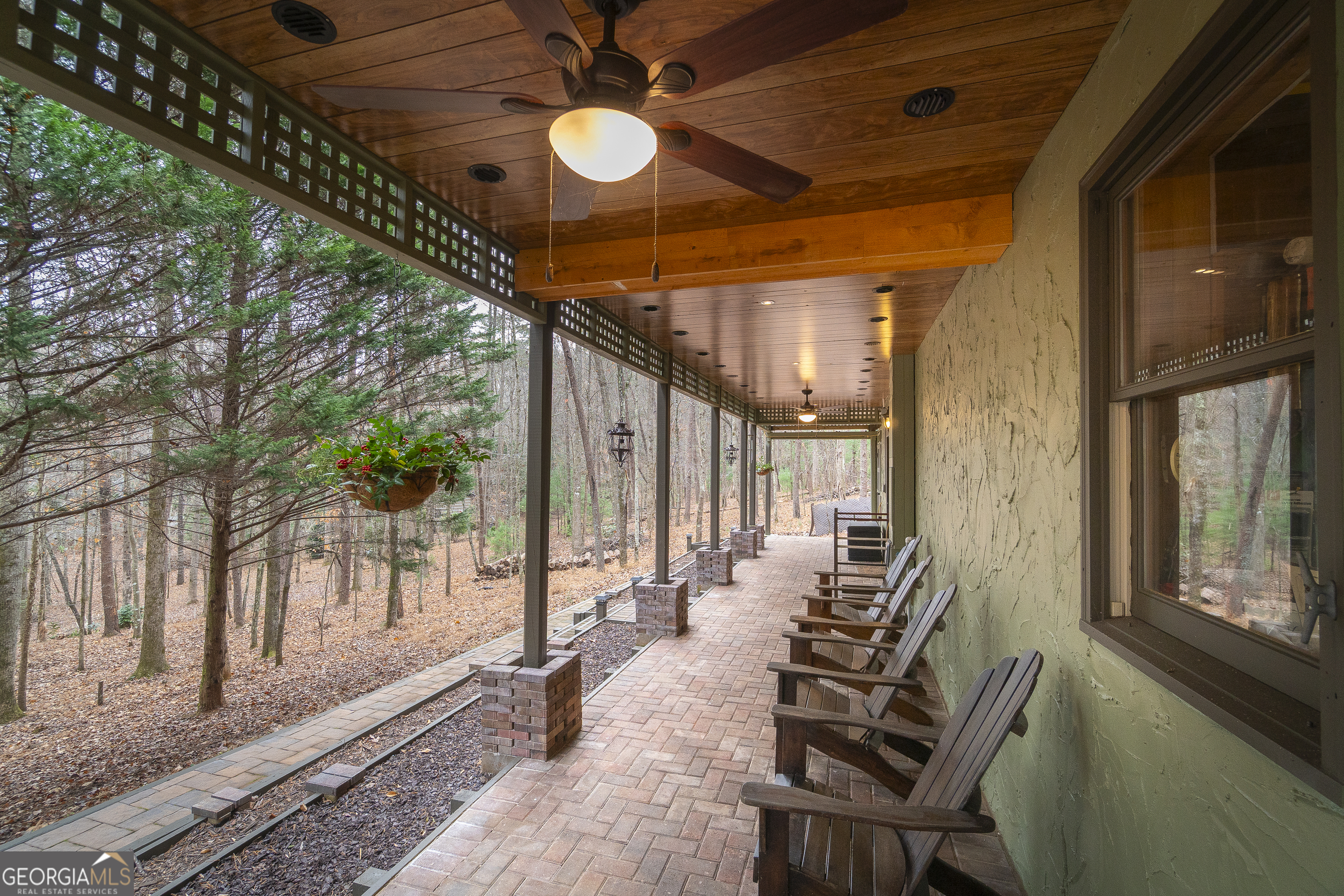 168 Cherokee Trail Sautee Nacoochee, GA 30571 - Photo 7 of 80 a view of a porch with furniture and a yard