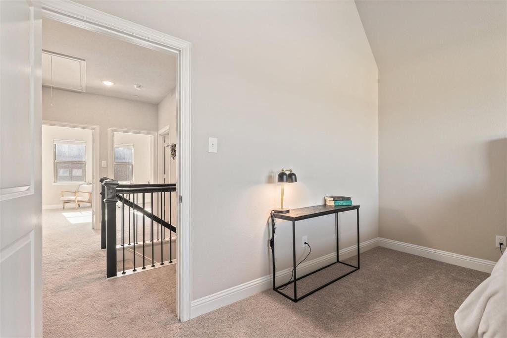 6246 Rilla Street Frisco, TX 75035 - Photo 13 of 26 a view of a hallway with workspace
