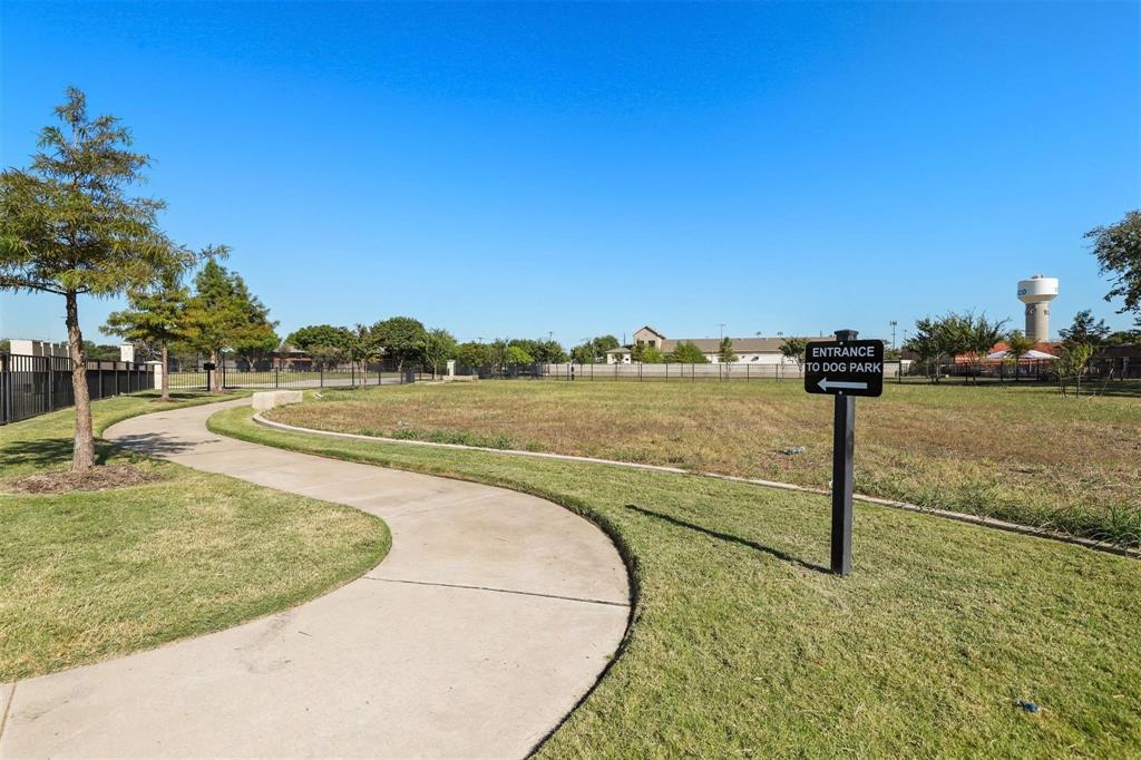 6246 Rilla Street Frisco, TX 75035 - Photo 22 of 26 a view of a swimming pool with an ocean view