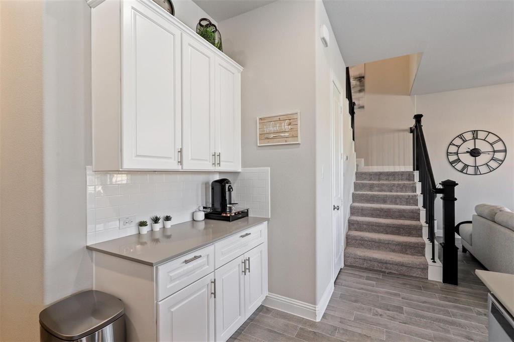 6246 Rilla Street Frisco, TX 75035 - Photo 8 of 26 a view of entryway and hall with wooden floor